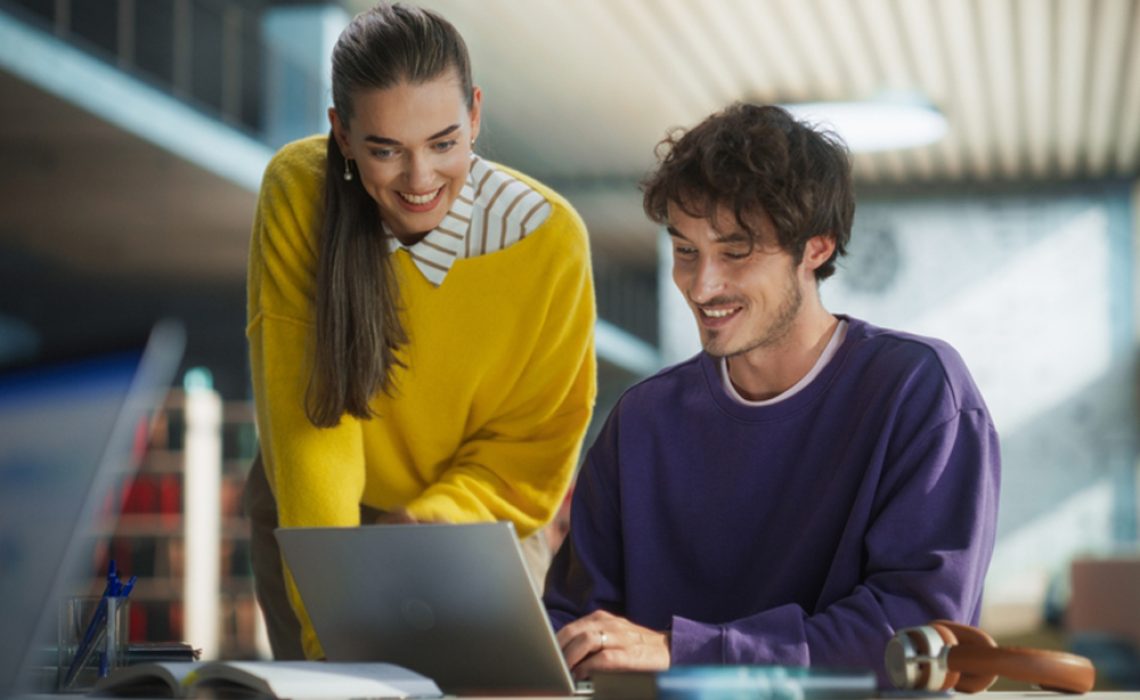 Hands typing on laptop with programming code on screen, representing software development. Perfect for coding, IT solutions, digital technology, web applications.